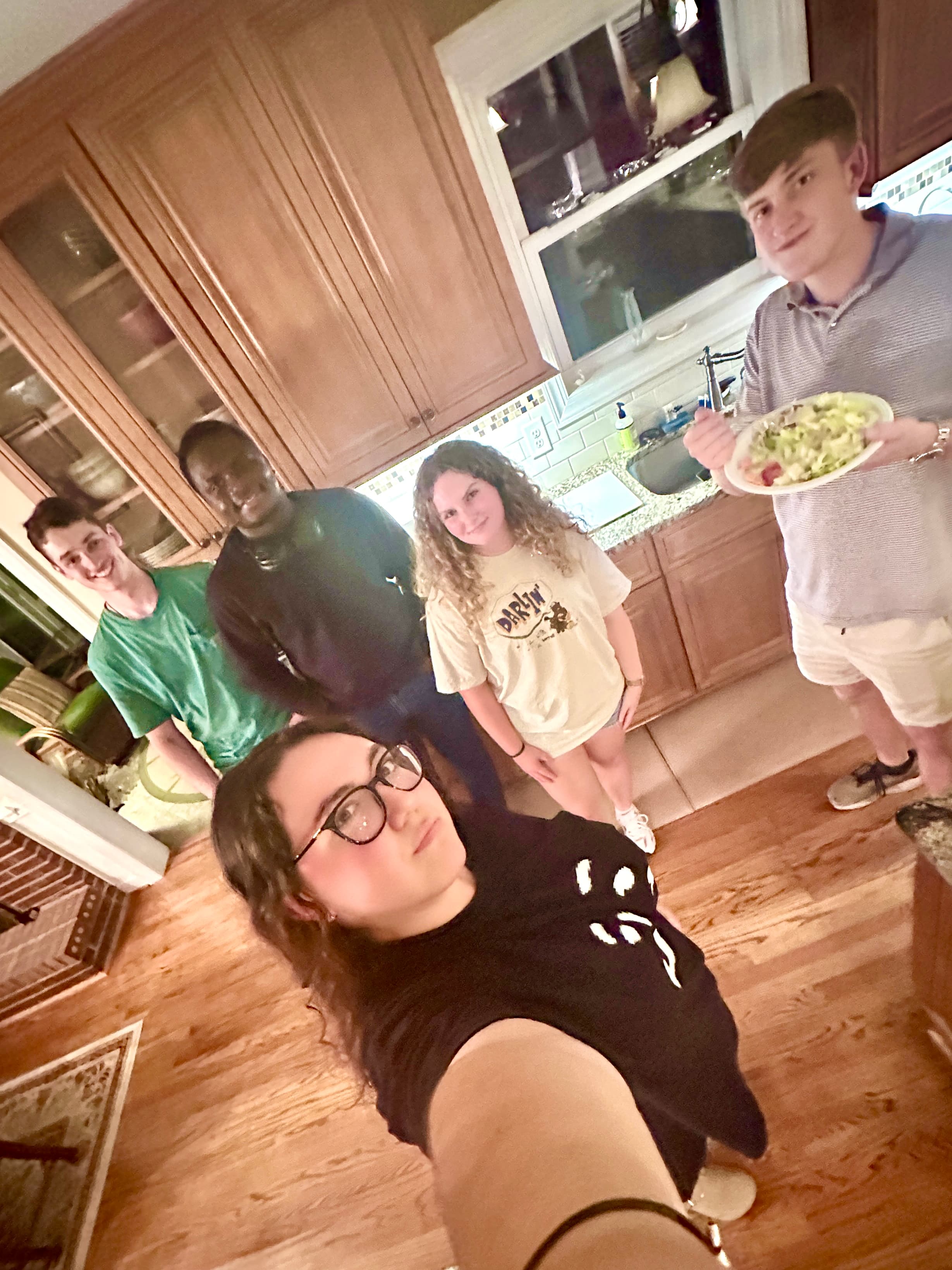 CrossPath students gathered in a home